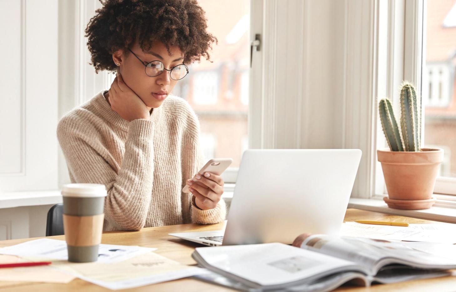 Franchise financial analysis workspace with documents and charts